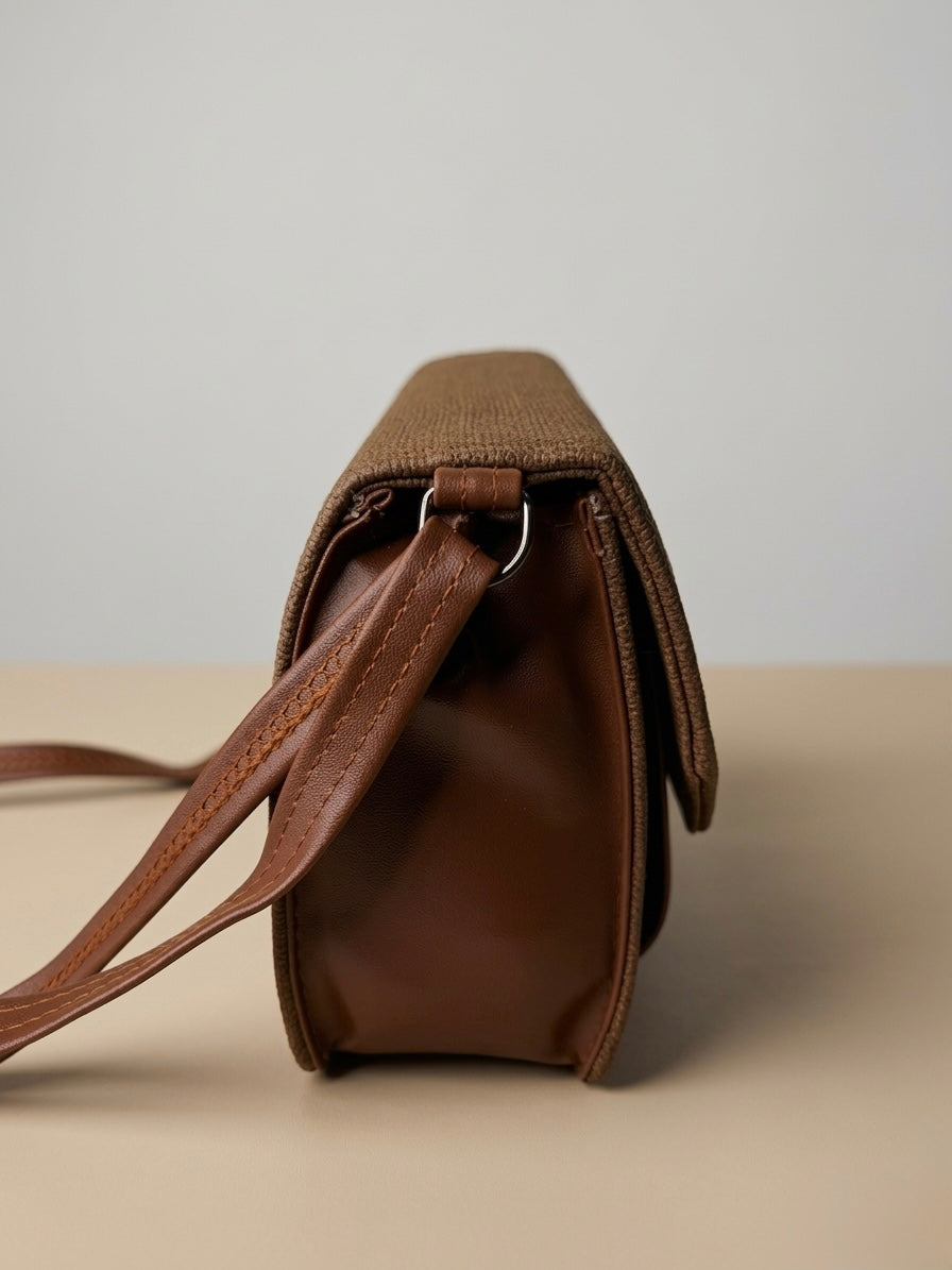 Brown convertible sling/clutch bag