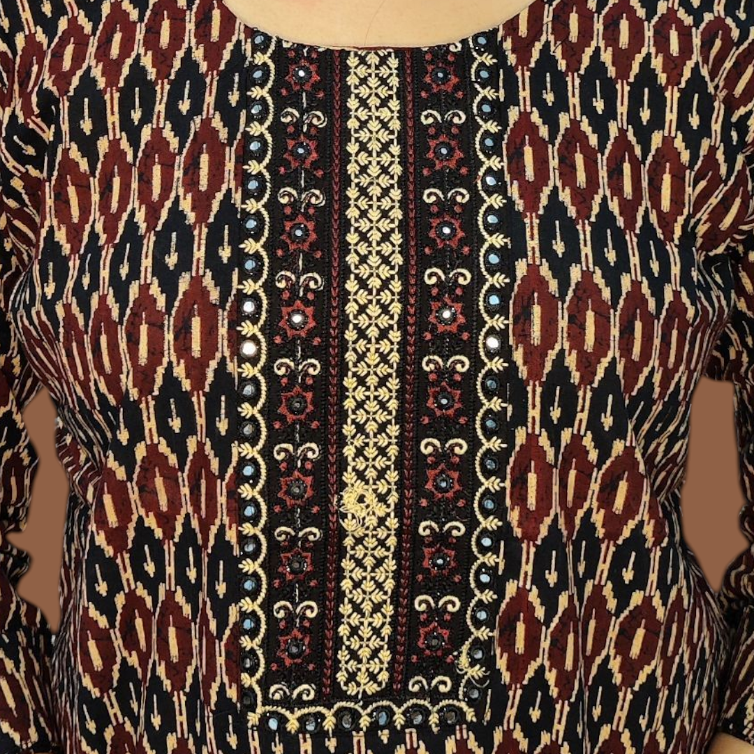 Patterned fabric with intricate design on a plain background